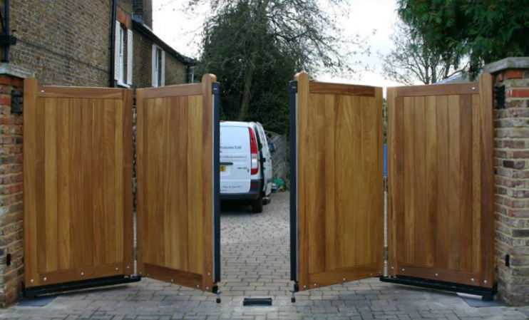 Wooden bi-fold driveway gates